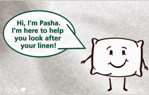 A pillow with a speech bubble that says i'm pasha help you look after your linen.